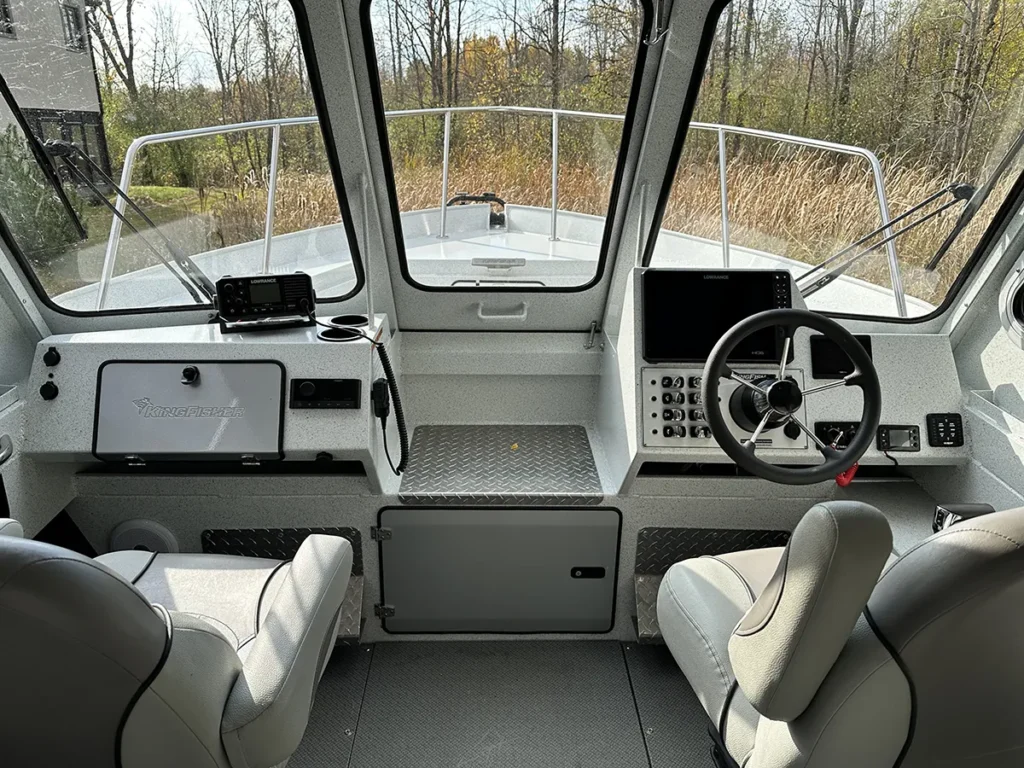 Helm and cabin interior of Dún Mara charter boat.