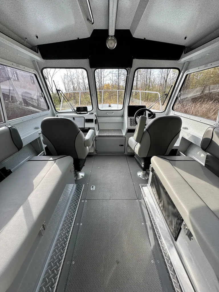 Comfortable cabin seating inside Dún Mara fishing charter boat.