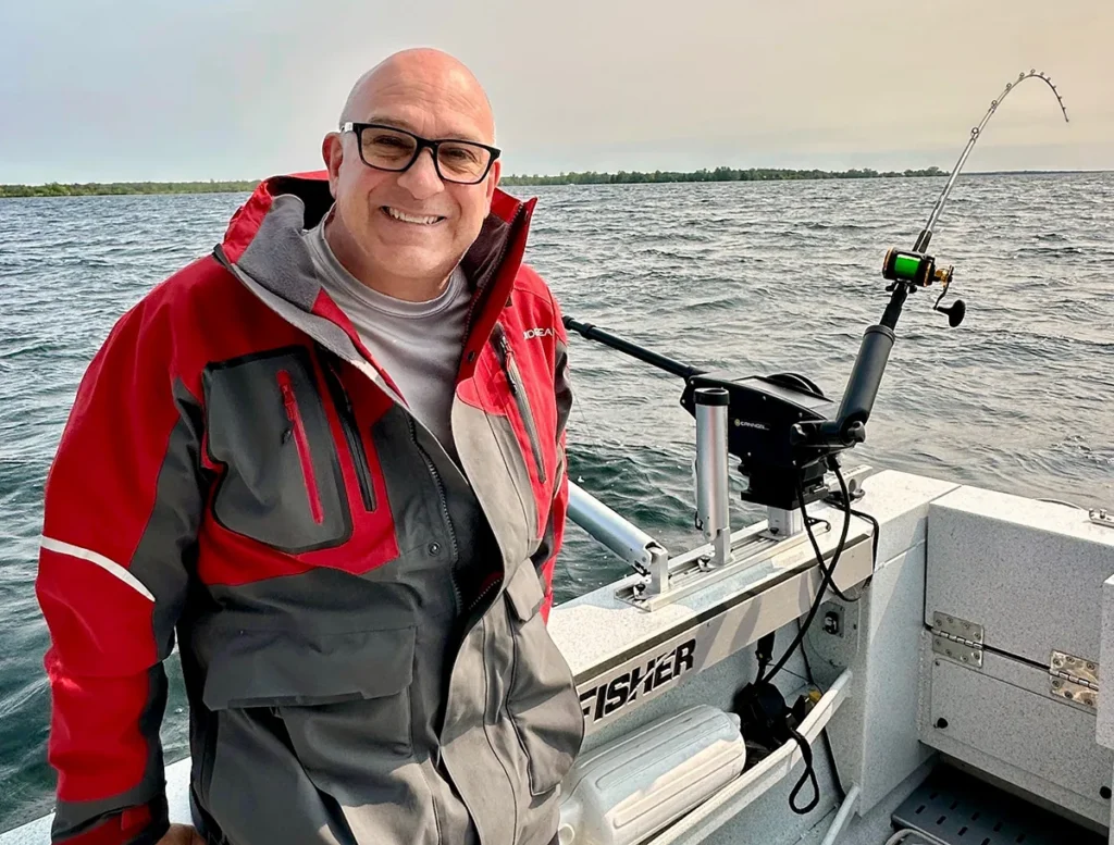 Captain Dave trolling on Lake Ontario during guided fishing charter.