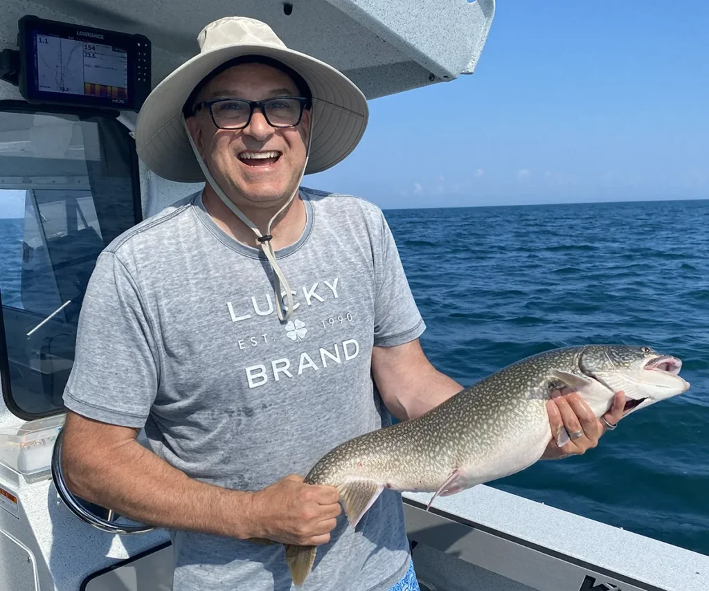 Stocky Lake Ontario lake trout ready for release