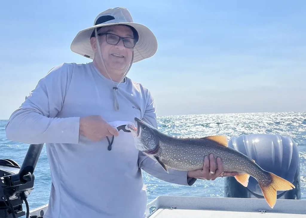 Brightly colored Lake Ontario lake trout caught trolling deep water